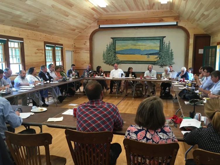 State and community leaders take part in a roundtable discussion about broadband in Maine following a ribbon cutting on the Cranberry Isles in July.