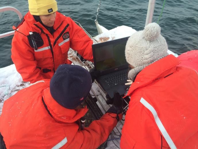 Dr. Susie Arnold collecting data about the ocean chemistry.