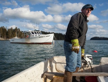 Kristan Porter heads out to one of his two boats.