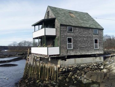 The Flood family cottage, a former fish house, is prepared to be set on a higher foundation. PHOTO: COURTESY TIM FLOOD