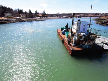 A barge  moored in Bucks Harbor.