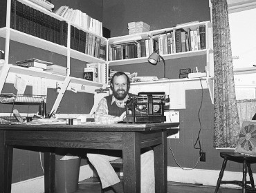 Island Ad-Vantages publisher and editor Nat Barrows at his typewriter in the early years. 