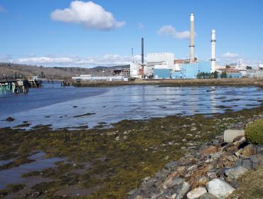 The now-defunct Verso paper mill in Bucksport with the oil dock visible at left.