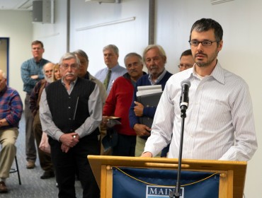 Gabe Pendleton, a member of the Islesboro Select Board, speaks April 24 at a hearing on ferry rates.