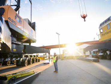  Jon Nass, director of the Maine Port Authority, poses near some of the Port of Portland’s equipment.