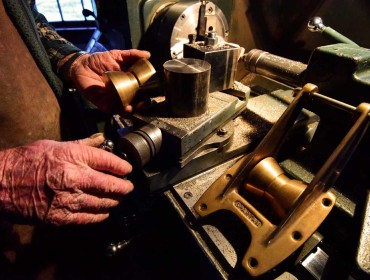 The hands of Skip Collins at Spartan Marine.