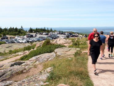 The top of Cadillac Mountain on a busy summer day.