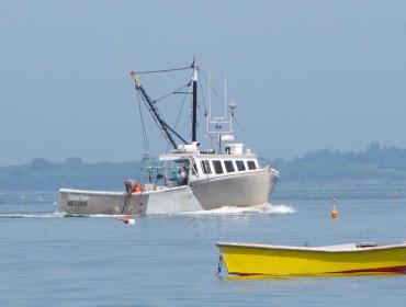 Fishing boat, dory off Chebeague