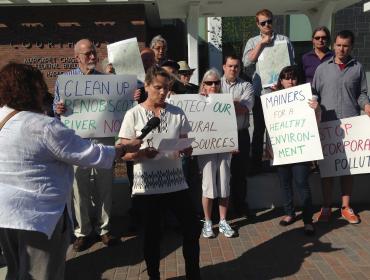 Protestors outside the Bangor federal building in June.