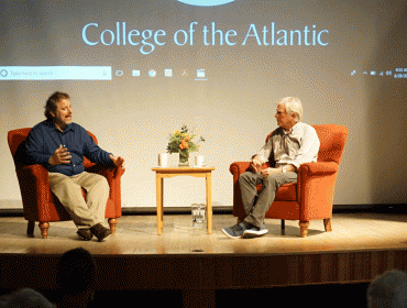 College of the Atlantic’s Sean Todd, left, speaks with ocean researcher David Shaw at an Aug. 28 “Coffee and Conversation” event at the college.