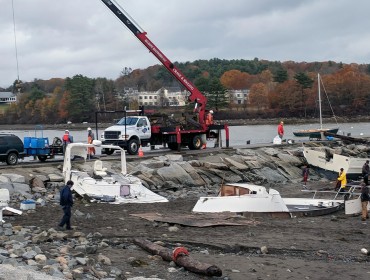 The remnants of boats destroyed in the Oct. 30 storm washed ashore near Belfast's breakwater.