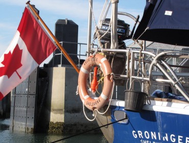 Canadian flagged sailboat