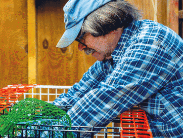 Donnie Carlson builds a lobster trap.