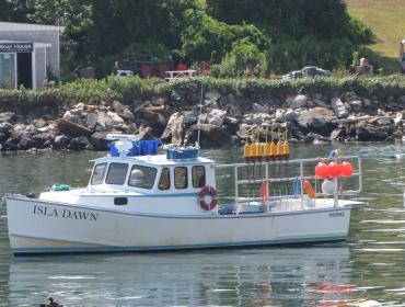 The Isla Dawn moored off Long Island.