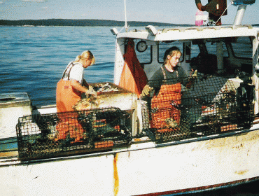 Sisters Betsy and Jill Philbrook fish from their boat off Swan's Island