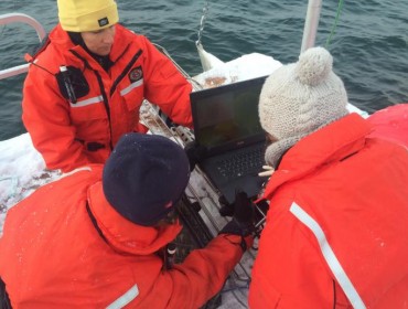 Dr. Susie Arnold collecting data about the ocean chemistry.