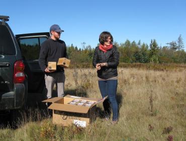 Ben Algeo and Suzanne MacDonald unload LEDs