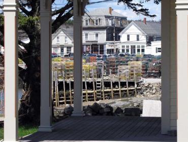 Vinalhaven's downtown seen through a porch.