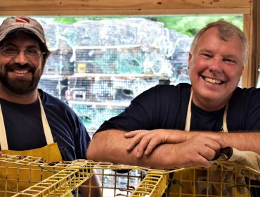 Buzz Scott (right) and colleague Matt Louis oversee the lobster trap recycling center adjacent to the Gouldsboro transfer station on behalf of the OceansWide Traps 2 Treasure project. Unlike the next-door transfer station, the facility offers lobster trap