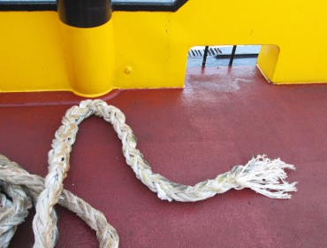 Rope coiled on deck of ship