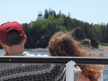 A couple ride the Maine State Ferry Service boat to Vinalaven.