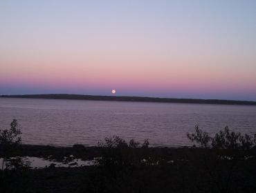 Full moon rises over Islesboro.