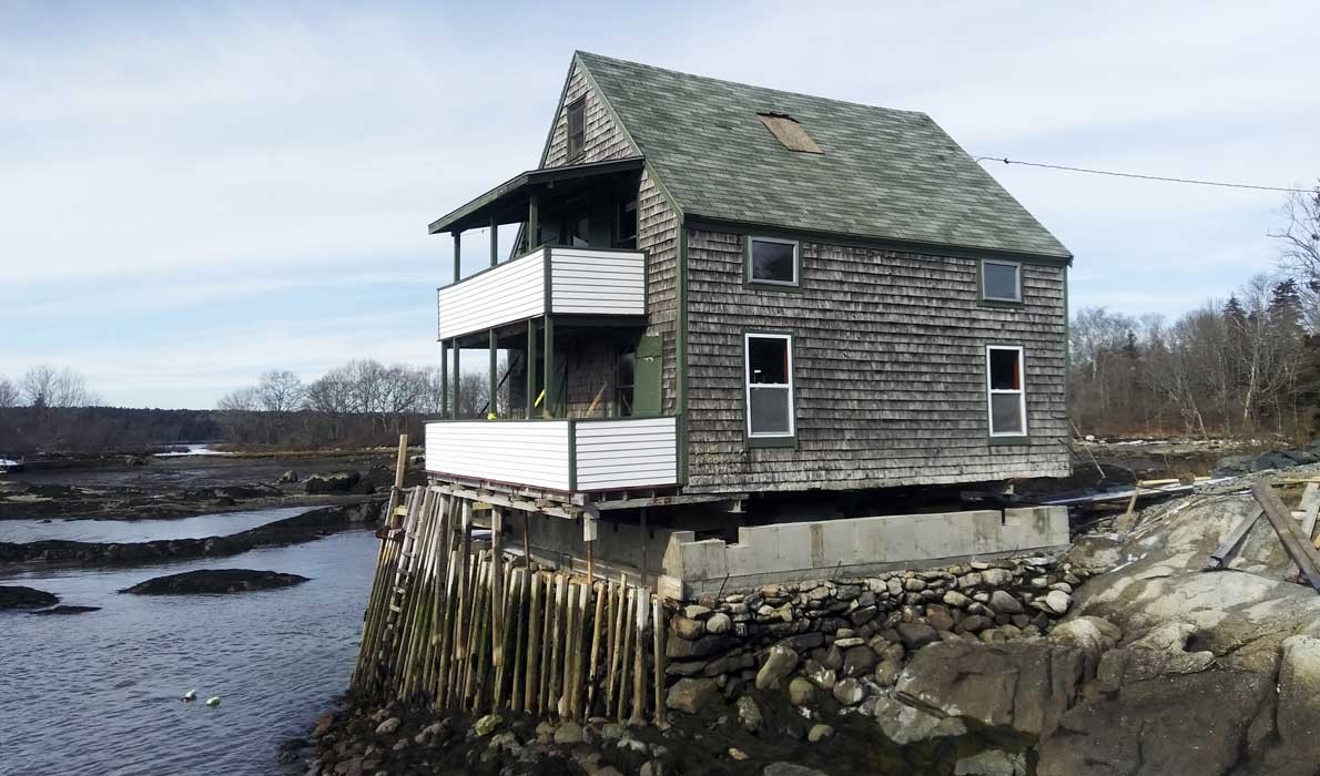 The Flood family cottage, a former fish house, is prepared to be set on a higher foundation. PHOTO: COURTESY TIM FLOOD