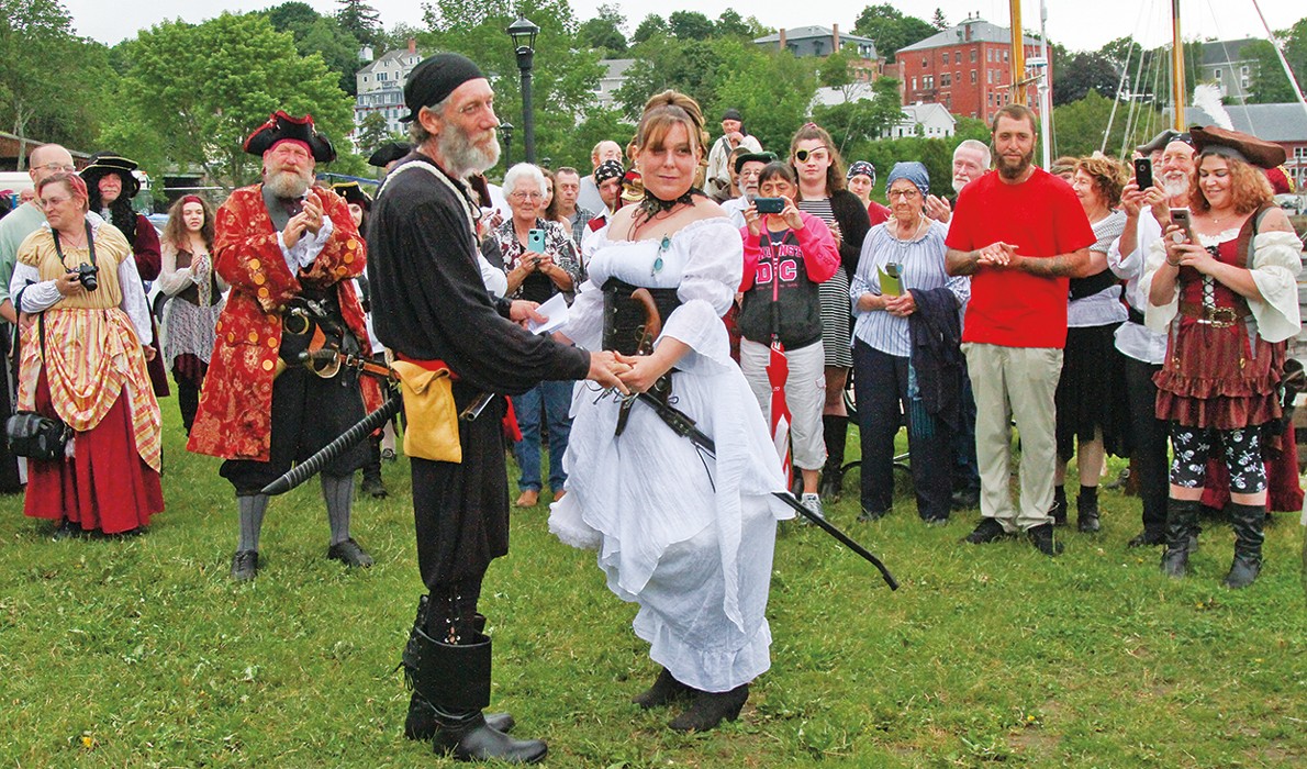 The groom and bride as pirates.