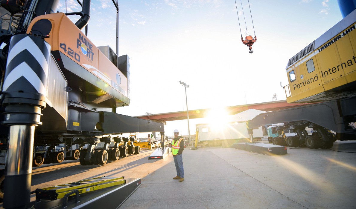  Jon Nass, director of the Maine Port Authority, poses near some of the Port of Portland’s equipment.