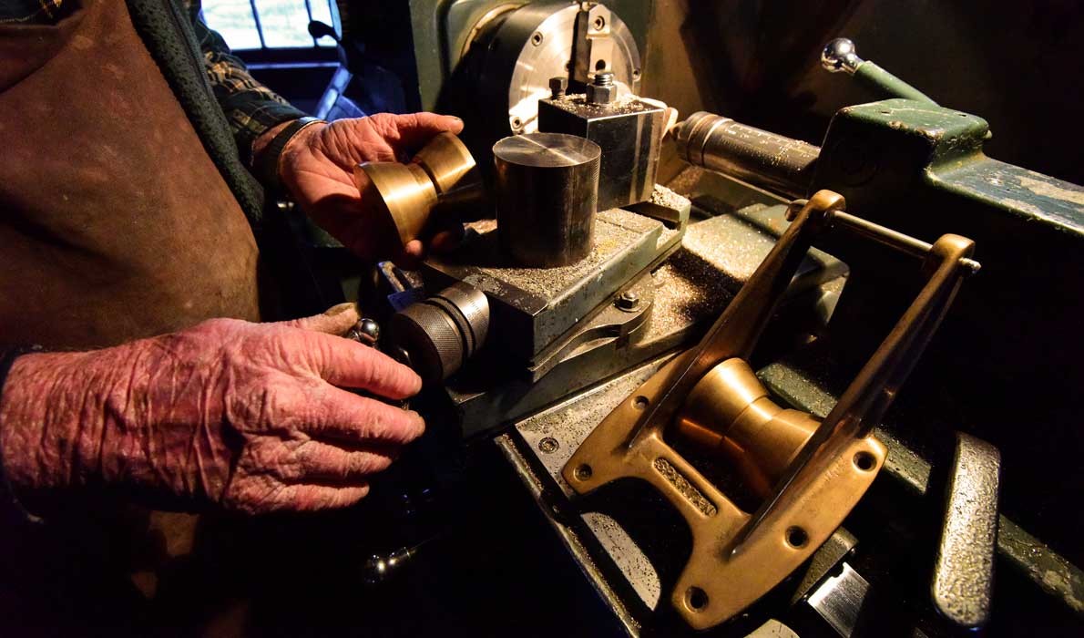 The hands of Skip Collins at Spartan Marine.