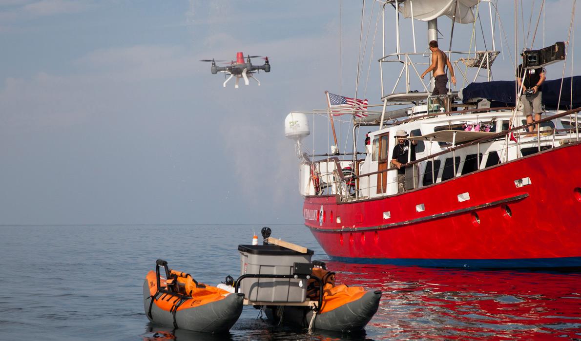 A drone flies over a simulated whale exhale