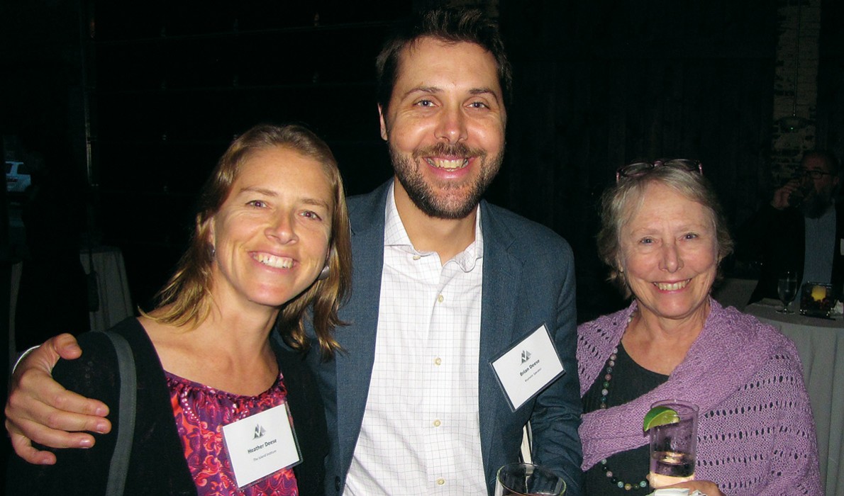 Brian Deese, center, with his sister Heather Deese (left) and mother Patricia Stanton (right).