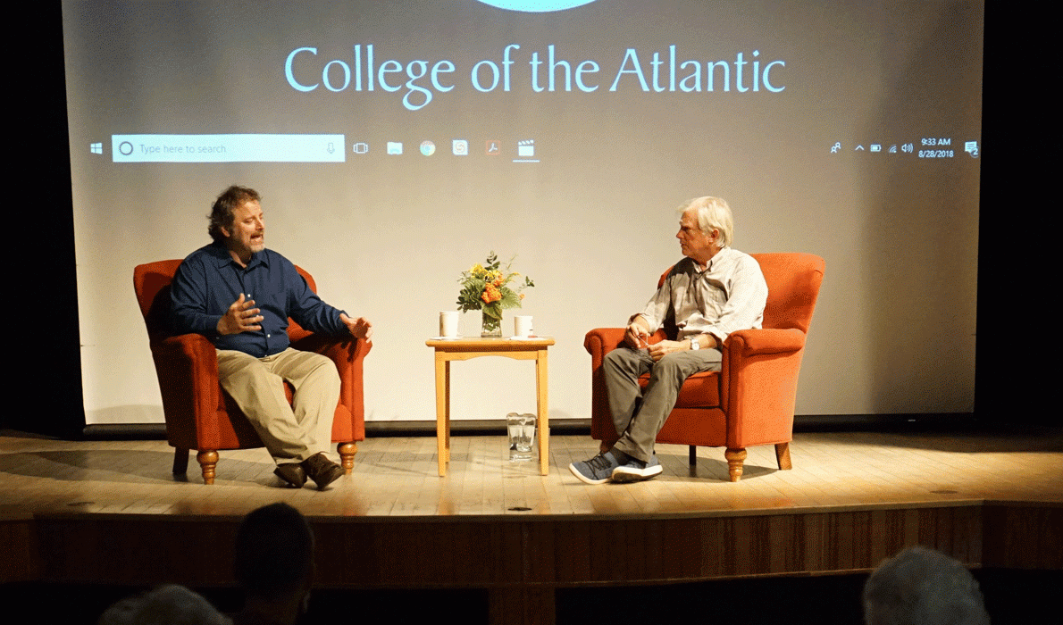 College of the Atlantic’s Sean Todd, left, speaks with ocean researcher David Shaw at an Aug. 28 “Coffee and Conversation” event at the college.