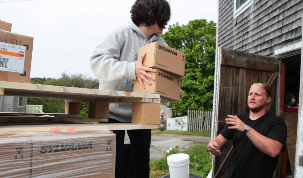 unloading LED bulbs on Monhegan