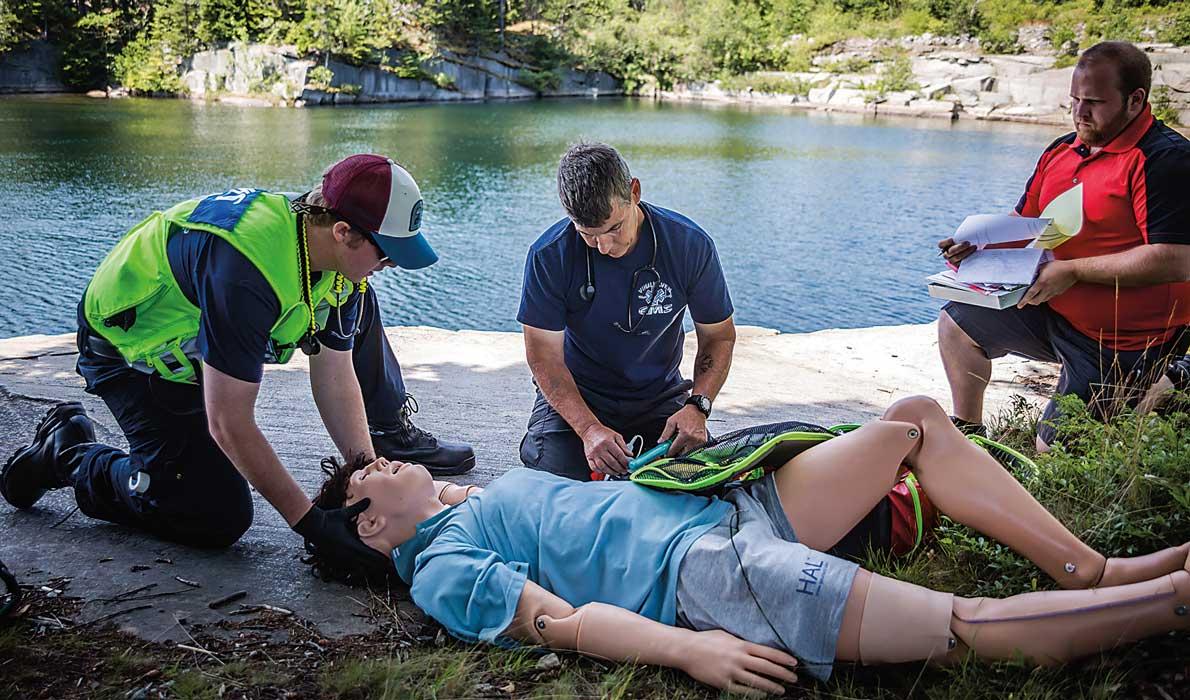 Working with a mannequin at one of Vinalhaven's quarries.