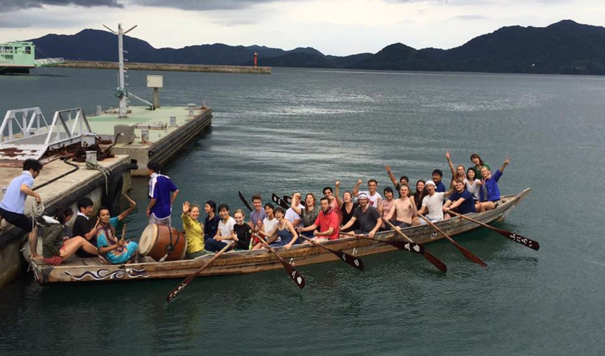 COA students try their hand at rowing a "dragon" boat.