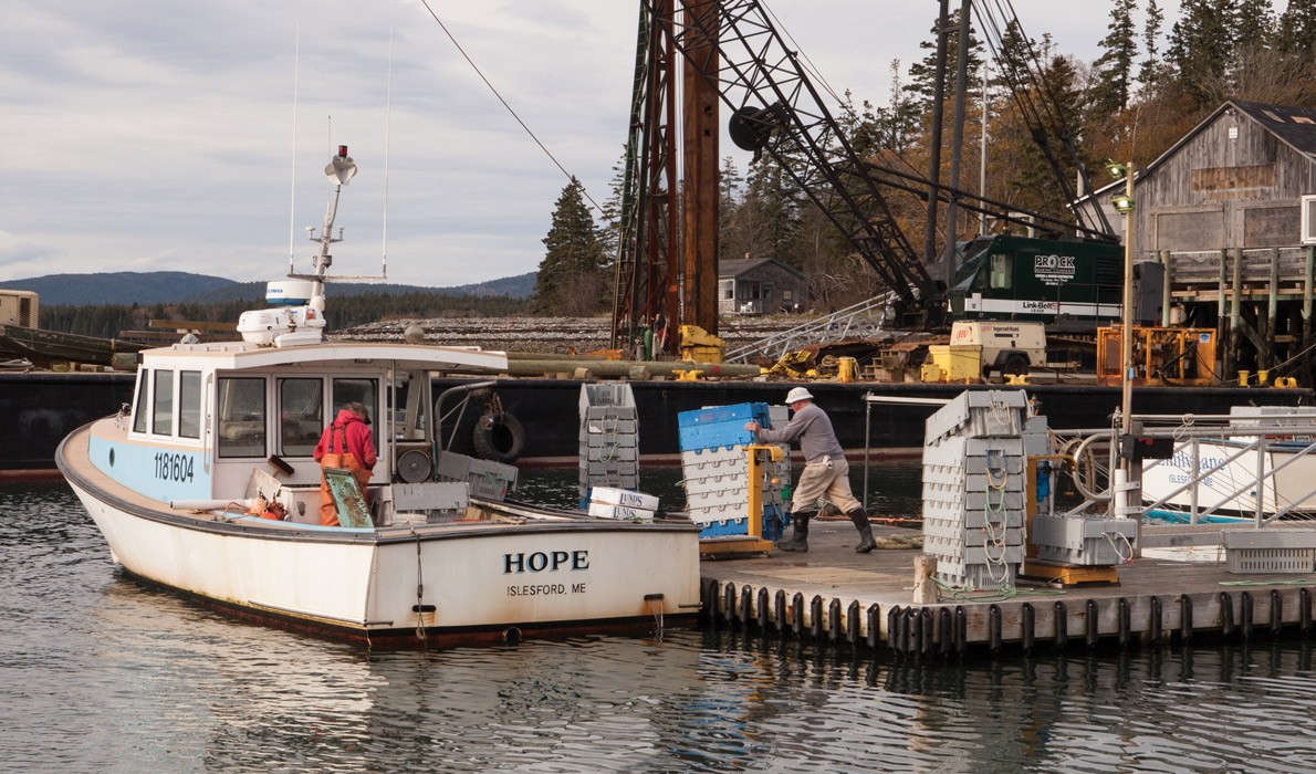 Fishermen work on the Islesford waterfront as November settles in.