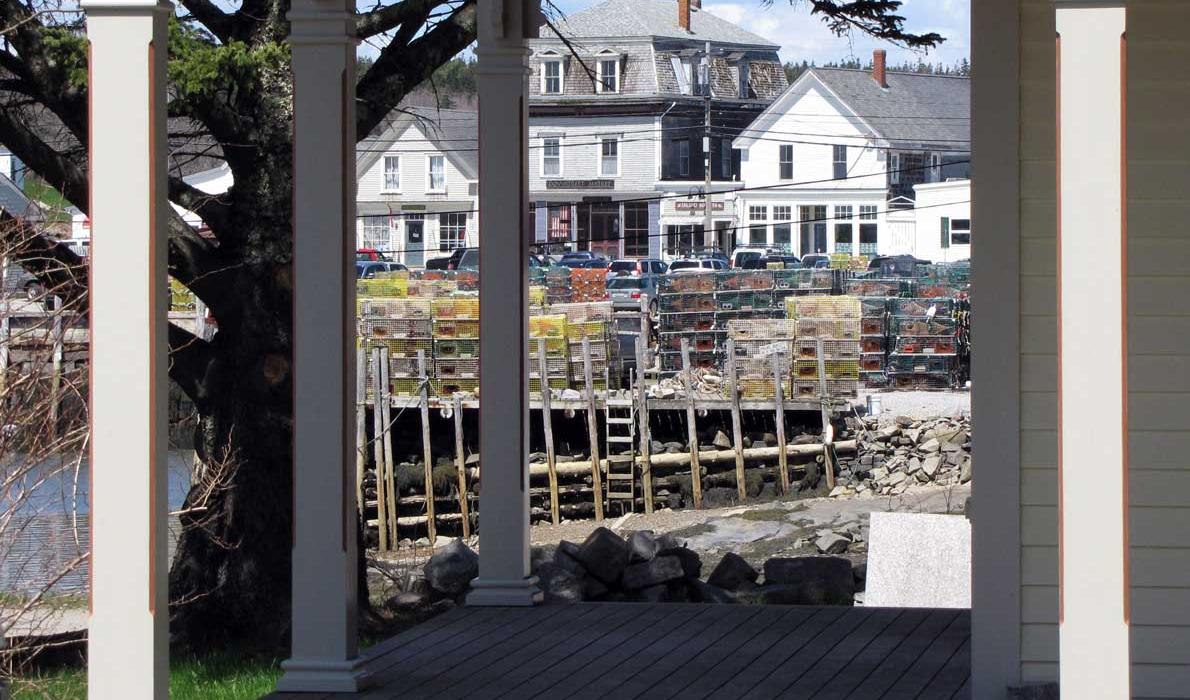 Vinalhaven's downtown seen through a porch.