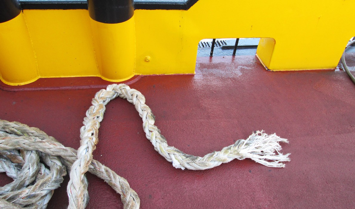 Rope coiled on deck of ship