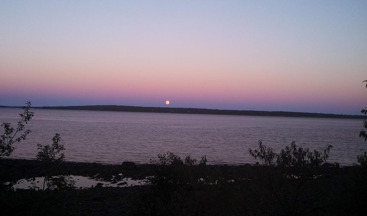 Full moon rises over Islesboro.