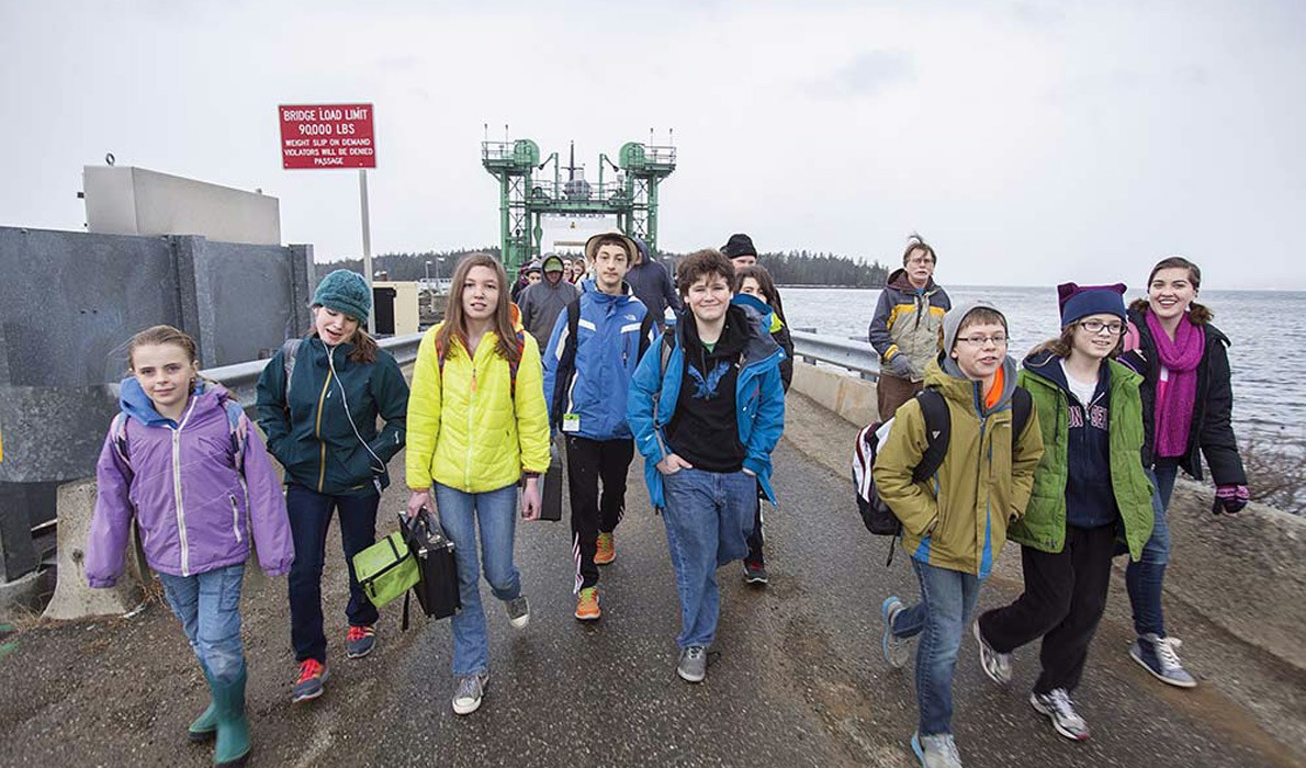 Students disembark from the ferry on Islesboro